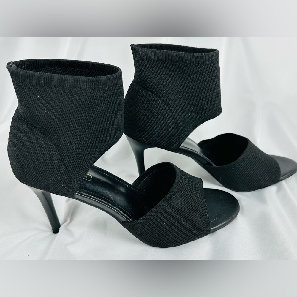 NWOT Black Heels with Fabric Ankle Detail. Comfortable and stylish. Size 9
